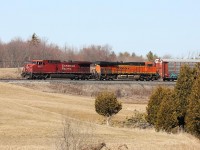 The rare has become the regular as, once again, a BNSF unit trails on 147 east of Cambridge