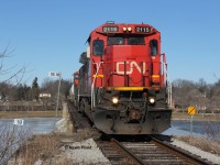 CN A402 is crawling over the Grand River at Caledonia with CN 2115-5647 for power. 