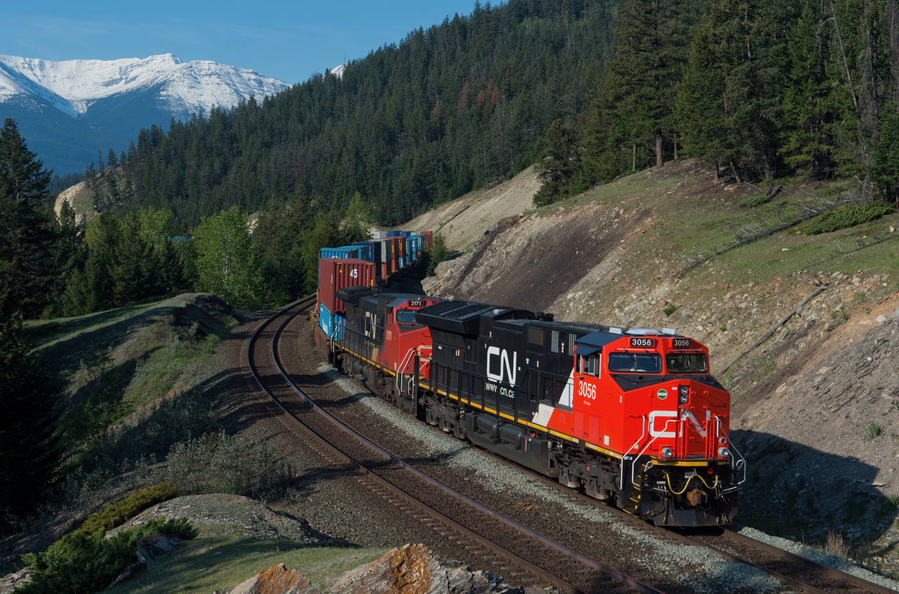A perfect spring morning in Jasper sees a shiny clean CN 3056 making it's way east toward English.