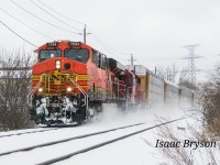 Toronto has seen a flurry of foriegn power early on in 2021 with the highlight being dozens of BNSF locomotives. It feels like we hear about another BNSF locomotive incoming every day. A major plus is that a fair few have been leading. One of the more notable BNSF locomotives to run the rails through Toronto was BNSF 7694. Painted in "Heritage 2", it is a relatively uncommon sight for a BNSF Gevo. Trailing is CP 3119 and 30 cars before a rear DPU?!?
BNSF 9161 shoves the train up towards Toronto yard. This suprisingly isn't the first time I've captured bookend BNSFs, the first being on CN in 2018 with my phone, but this duo was much more interesting!