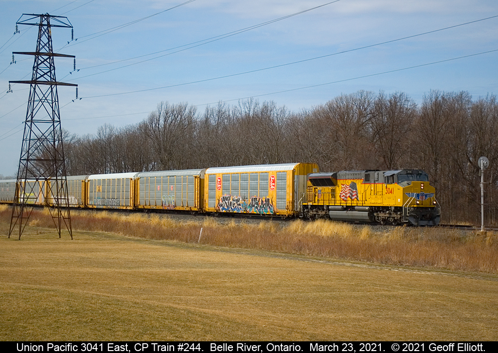 Union Pacific SD70AH #3041 leads CP Train #244 solo through Belle River, Ontario as it is about to knock down  a clear signal at MP 92.8 of the CP Windsor Subdivision on March 23, 2021.