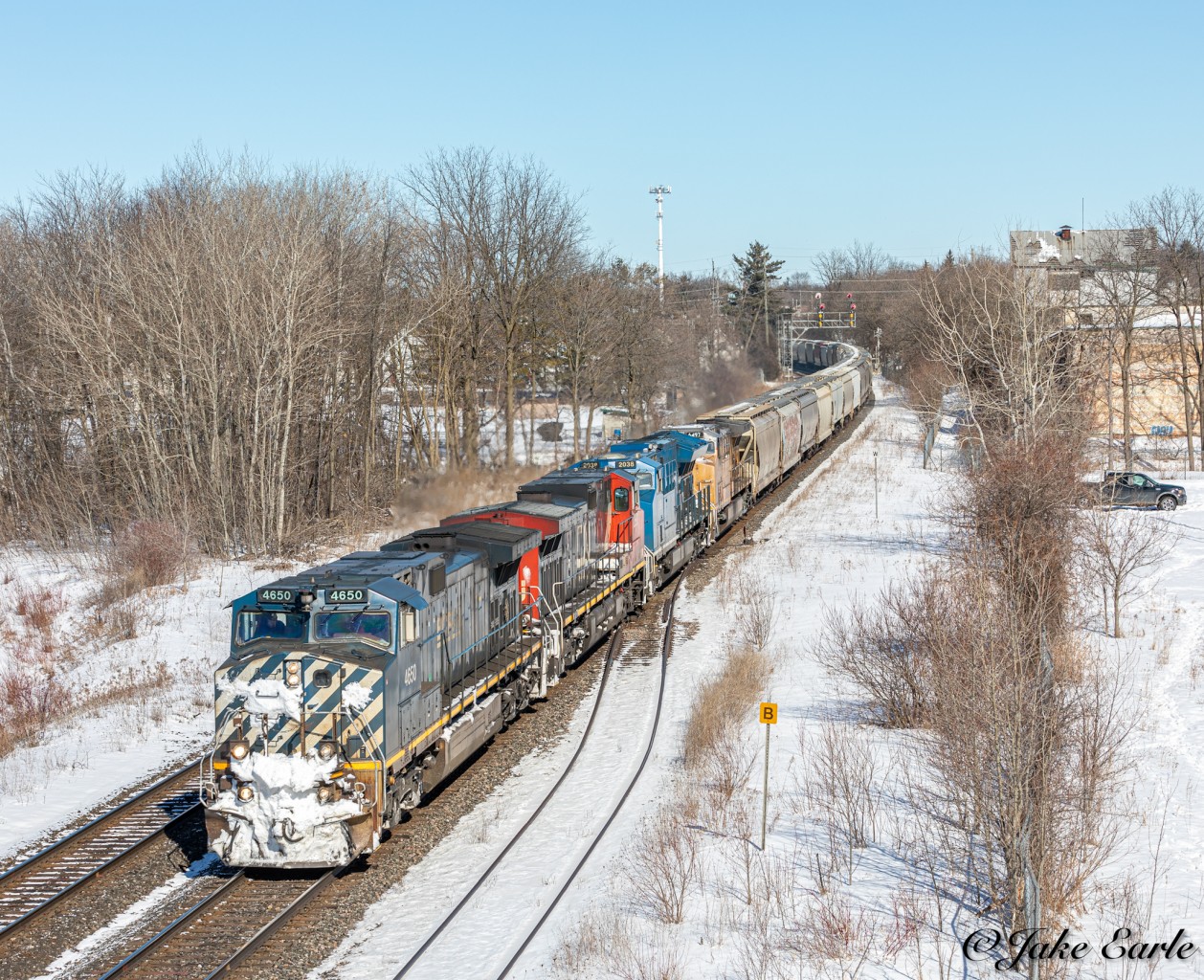 CN M305 passes through Brockville with quite an amazing lashup. In the mix is BCOL 4650, CN 2693, GECX 2038, & UP 6497, all headed for Mac Yard.