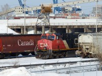 GE ES44DC 2271 leads CN L527 Through Point-Saint-Charles yard as it starts it’s switching. Notice the brakeman just got off and is walking along side the train to go uncouple some cars.