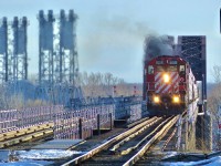 CP 251 has been getting a lot of older EMD power the last few months and has struck again. 1981 built CP SD40-2 6018 led 251 on that day, followed by a dirty GE. It’s seen here crossing the Saint-Lawrence river on CP’s LaSalle bridge. Shot was taken from EXO’s LaSalle Station.