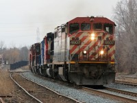 Wasting no time, eastbound CN L533 makes its way through Guelph approaching Edinburgh Road on the Guelph Subdivision with BCOL 4607, 5258, GMTX 2325, 4125, 2635 and 4116. GP9RM 4116 was lifted at Kitchener on this rare daylight appearance by this train. March 28, 2020. 
