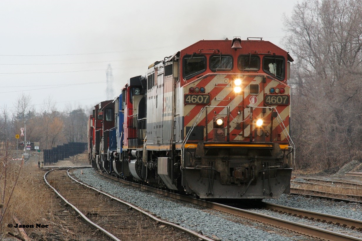 Wasting no time, eastbound CN L533 makes its way through Guelph approaching Edinburgh Road on the Guelph Subdivision with BCOL 4607, 5258, GMTX 2325, 4125, 2635 and 4116. GP9RM 4116 was lifted at Kitchener on this rare daylight appearance by this train. March 28, 2020.