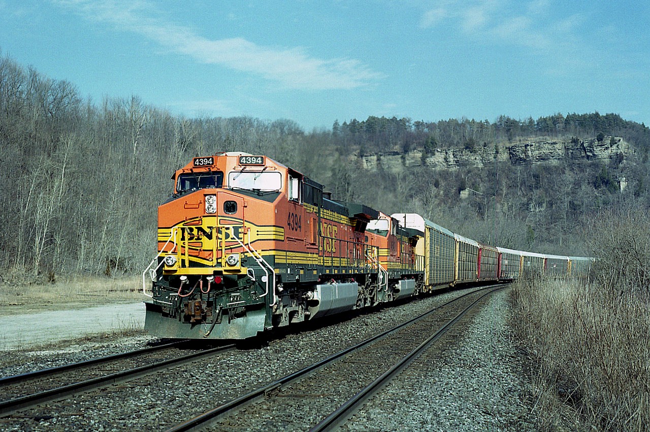 Such "heady" days they were.  And only 15 years ago when you just never knew what would show up leading a CN train. And as a bonus, there were quite a few more trains as well.
In this scene it is in the early afternoon and CN's #393 came up the grade thru Dundas with a pair of BNSF up front. BNSF 4394 and 4542. And a beautiful crisp day !!
This one was a surprise to me. I just wanted to shoot something running west on the north track. Made for a nice shot.