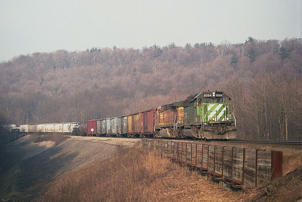 Nice treat to start off a day.......I am at mile 2 Dundas bright and early, this train rounded the curve heading toward Bayview at 0702 hrs. Power is BNSF 8084, 5389. Checking my logbook, the first three freights I saw this day; 396, 385 and 399 all had BNSF in consist.