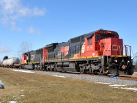 Sarnia - Garnet train A40231 05 passing through Cainsville with CN 2115, CN 5647, and 14 cars