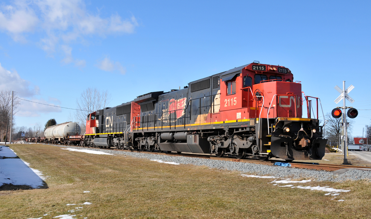 Sarnia - Garnet train A40231 05 passing through Cainsville with CN 2115, CN 5647, and 14 cars
