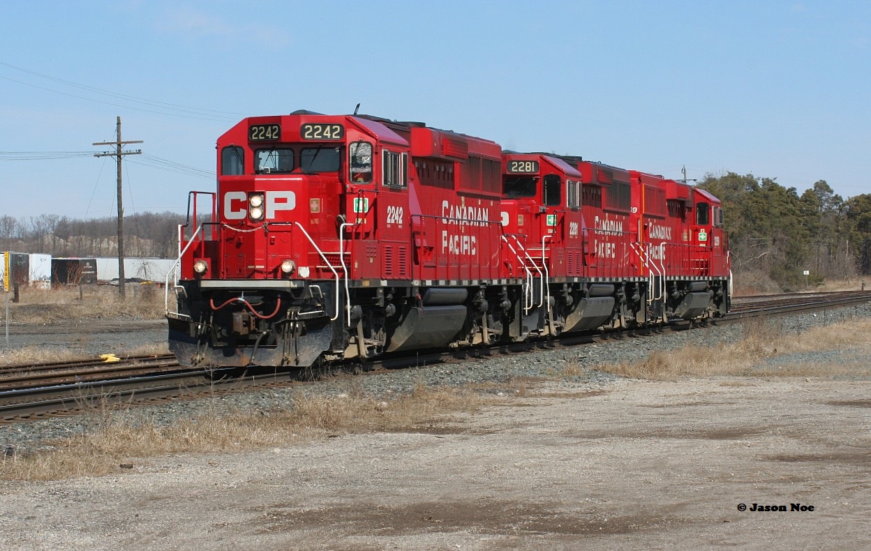 A trio of CP 2200's power T72 back to Wolverton yard light power as it rolls west through Ayr on the Galt Subdivision.
