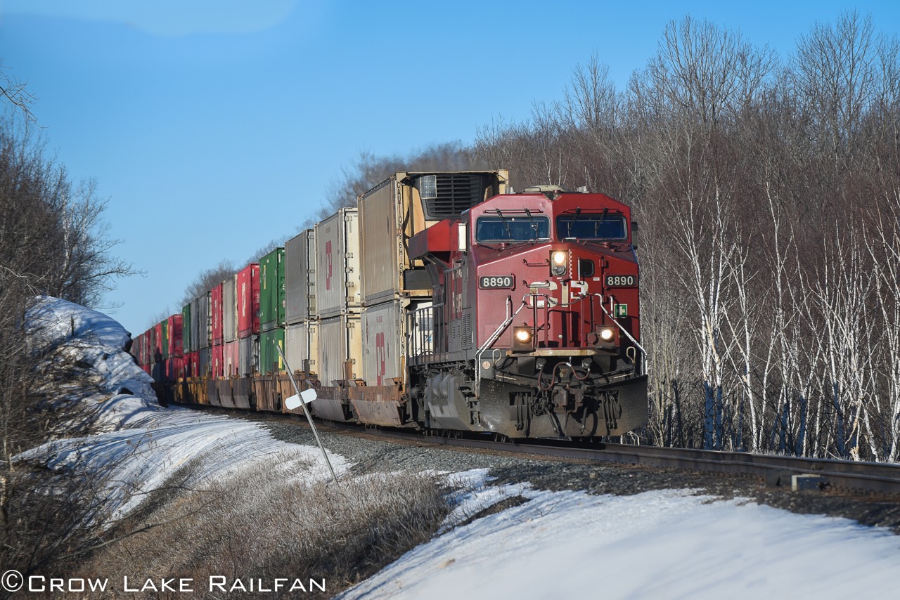 CP 112 breaks the silence as it makes it's way down the Belleville sub around Crow Lake on the final leg of its journey from Vancouver to Montreal this past weekend.
----
The view and angle here may not have been possible just weeks prior due CP clearing the sides of the tracks in the area recently.