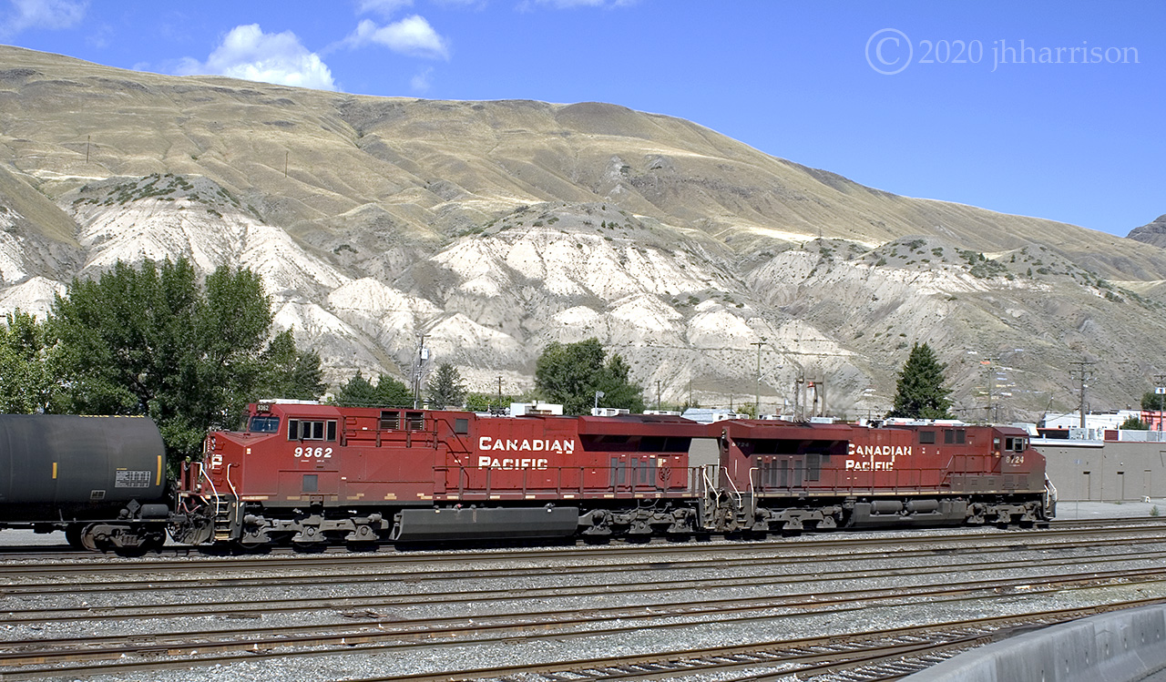 Another viewpoint of CP 8724 and 9362 traveling east at Ashcroft - CP Thompson Sub.