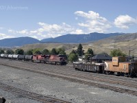 Eastbound CP 8724 and 9362 travel through the yard at Ashcroft on CPs Thompson Sub. The resident caboose is #434418.