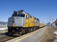 With wrapped VIA 6416 up front, VIA 67 is making its station stop at Dorval. At the other end is VIA 908.