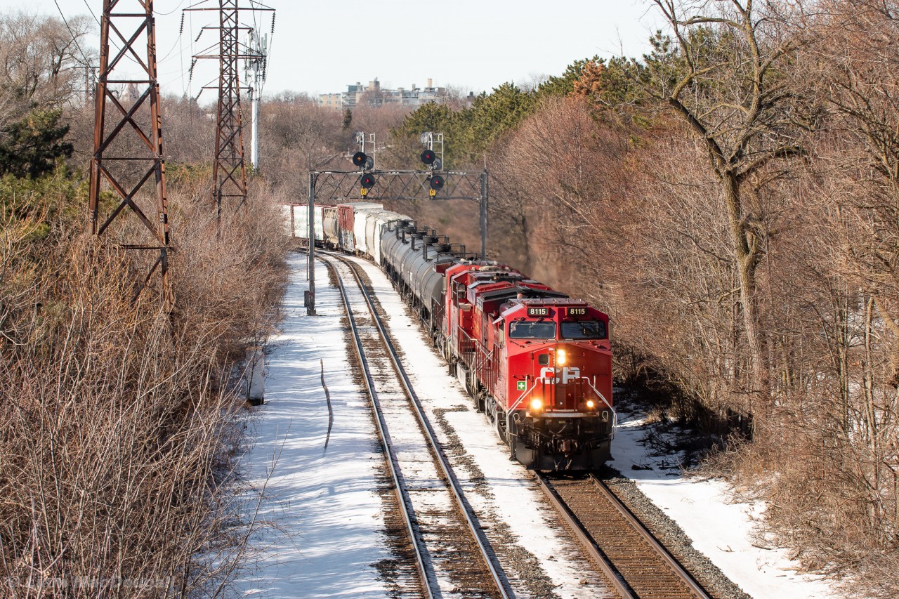 CP 118 heads east through mile 1.6 of the North Toronto in whatever remains of the morning sunlight around 11AM. They are about to pass under the Maclennan Avenue pedestrian bridge where I’m standing for this shot, a bridge which was constructed in the 60s originally after a grade crossing was removed, likely due to it being unsafe with the low visibility and high speed of trains, not to mention the fact that there were once a pair of crossovers here too.