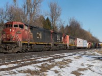 CN 435 grinds upgrade at Copetown behind a trio of Dash 8 variants.  CN 2438, CN 2133 and CN 2423 sounded great charging through Copetown on this sunny February afternoon.