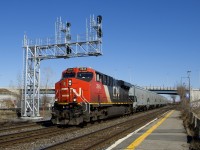 After being parked at Dorval for over half a day, empty grain train CN 875 has a fresh crew onboard and is on the move.