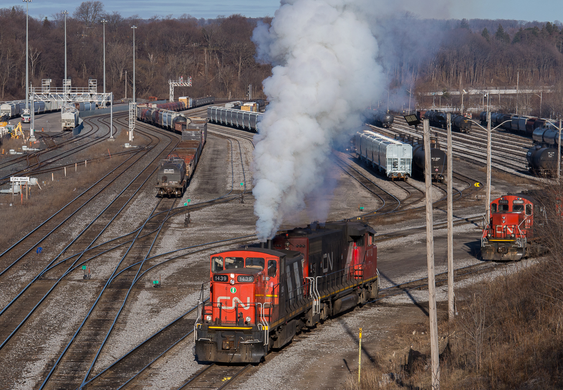 The CN 0700 yard job clears the carbon out of CN 1439 and CN 4770.  With word that the GMD-1's have been removed from the active roster, shooting CN 1439 for what could be one of my last times was a no brainer this morning.