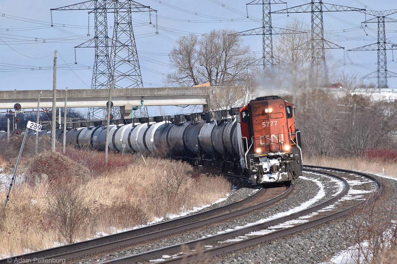 In situations where the power of L516 is just one engine, it's often that it'll just get turned around in Belleville to bring the return trip, L517, back to Toronto. After all, there's a perfectly good wye for them to use. For whatever reason that didn't happen on this particular day. Having brought 516 into Belleville the previous night, CN 5777 ended up leading 517 in reverse at track speed all the way to Toronto. Truly a sight to behold, and one reminiscent of the days when long hood forward was the norm. Just a few moments before I took this shot I heard the crew of 376, which passed me earlier, poke fun at 517's unusual setup over the radio. Something along the lines of "Lookin' good, but I think you're facing the wrong way". I couldn't help but chuckle at that once I saw 517 round the bend.