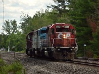 After doing their work in the Craighurst area and clearing in the siding at Essa for 113 to pass, the crew of GPS-01 has changed ends and moved the SBU, once run around and on the North end of their train they'll follow 113 running back to the yard at MacTier for the night. 