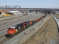 CN 321 has a pair of ET44AC's (CN 3245 & CN 3162) and 134 cars as it heads west. It will have to stop for a short time a bit further ahead to let VIA 67 overtake it. Up front are a cut of gondolas; very common on this train.