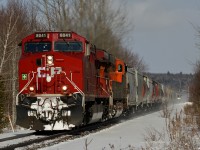 CP 8041 South about to fly through Line 10 just South of Medonte with a colorful ECAN "Winter Rail" grain train heading for the siding at Craighurst to meet an already waiting extra 421.  