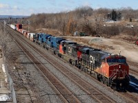 Even if the lighting wasn't the best, I certainly did not want to let this lash up get away without at least making an attempt on capturing it. CN 421/422 can certainly surprise one lately and today was no exception. Here GEVO 2326 leads a former BNSF/ATSF Dash-8, 2 demonstrator Tier4's GECX 2037 and 2038 ( not many of these left unrebuilt by CN) and JLCX 101, a former NS Genset, (interesting that when searching this unit online, JLCX 101 comes up as a GP9). The train is slowing to work Aldershot. 
