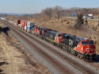 One of the more interesting trains lately around Southern Ontario has to be CN 422/421, often with at least a handful of units, not to mention DPU often on 421. Just about anything can show up on these trains depending on what is lingering in Toronto or Port Robinson. For the first full day of spring train 422 has a decent mix of power including a venerable Dash-8 in the form of 2430 with crude hand written number boards. Next stop for the train will be Aldershot yard before heading on to its destination of Toronto. The intermodal traffic is a common site these days as CN tries to build on intermodal traffic out of New York.