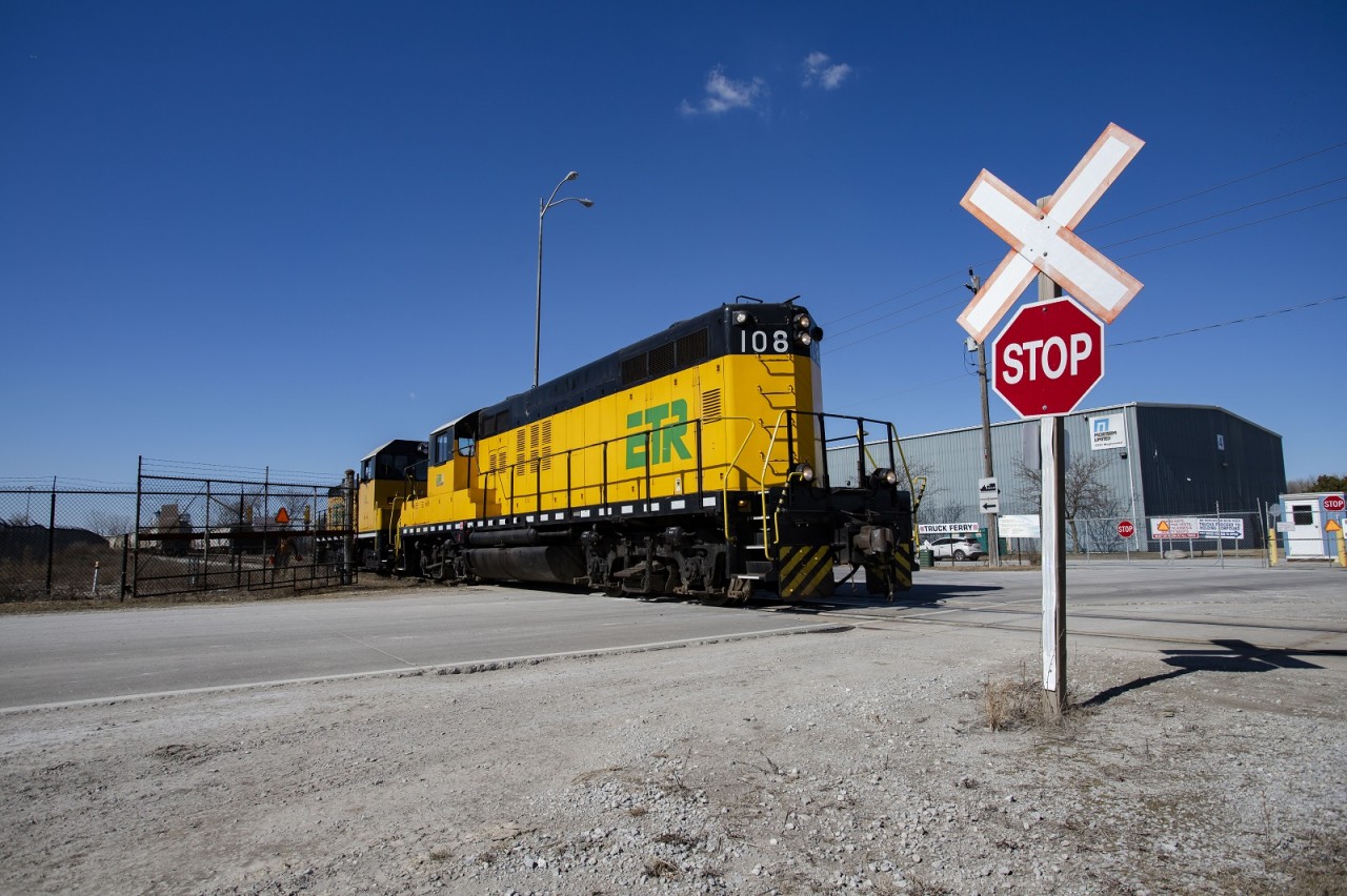 The 0900 crew pulls out of ADM light as they head back towards Ojibway Yard. There they will assemble their train for the return trip to interchange with CP/CN, and finally their Lincoln Road shops. In the background is Morterm Limited, the parent company of ETR. That facility specializes in transloading between rail, truck, and lake freighters. Also visible is the entrance to the international truck ferry between Windsor and Detroit for trucks carrying hazmat, and other loads that are restricted on the Ambassador Bridge and Windsor/Detroit tunnel.