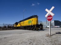 The 0900 crew pulls out of ADM light as they head back towards Ojibway Yard. There they will assemble their train for the return trip to interchange with CP/CN, and finally their Lincoln Road shops. In the background is Morterm Limited, the parent company of ETR. That facility specializes in transloading between rail, truck, and lake freighters. Also visible is the entrance to the international truck ferry between Windsor and Detroit for trucks carrying hazmat, and other loads that are restricted on the Ambassador Bridge and Windsor/Detroit tunnel. 