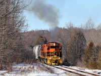 I was just leaving Guelph for home when I ran across the GEXR headed across Victoria Road on their way back to Guelph Junction. I got ahead of it and around the corner, out of the woods it came with QG 3800 and its slug mate QG 800 leaving a nice (for me anyways) plume of heat and exhaust. 