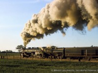 Homeward bound to Toronto, CNR 6218 is seen departing Lindsay for the last 68 miles to Union Station.  Today's trip run by the Upper Canada Railway Society was a two part excursion, running behind 6218 from Toronto to Lindsay, and continuing from Lindsay to Haliburton and return behind a pair of GMD-1s, as had been done <a href=http://www.railpictures.ca/?attachment_id=17673>the year prior in 1963.</a>


<br><br>More steam at Lindsay:<br>CNR 6167 coaling up: <a href=http://www.railpictures.ca/?attachment_id=26517>Bill Thomson, 1962</a><br><br>CNR 6167 eastbound on the Campbellford Sub: <a href=http://www.railpictures.ca/?attachment_id=43376>Bruce Lowe, 1964</a><br><br><i>Bryce Lee Photo, Jacob Patterson Collection slide.</i>  Geotagged location not exact.