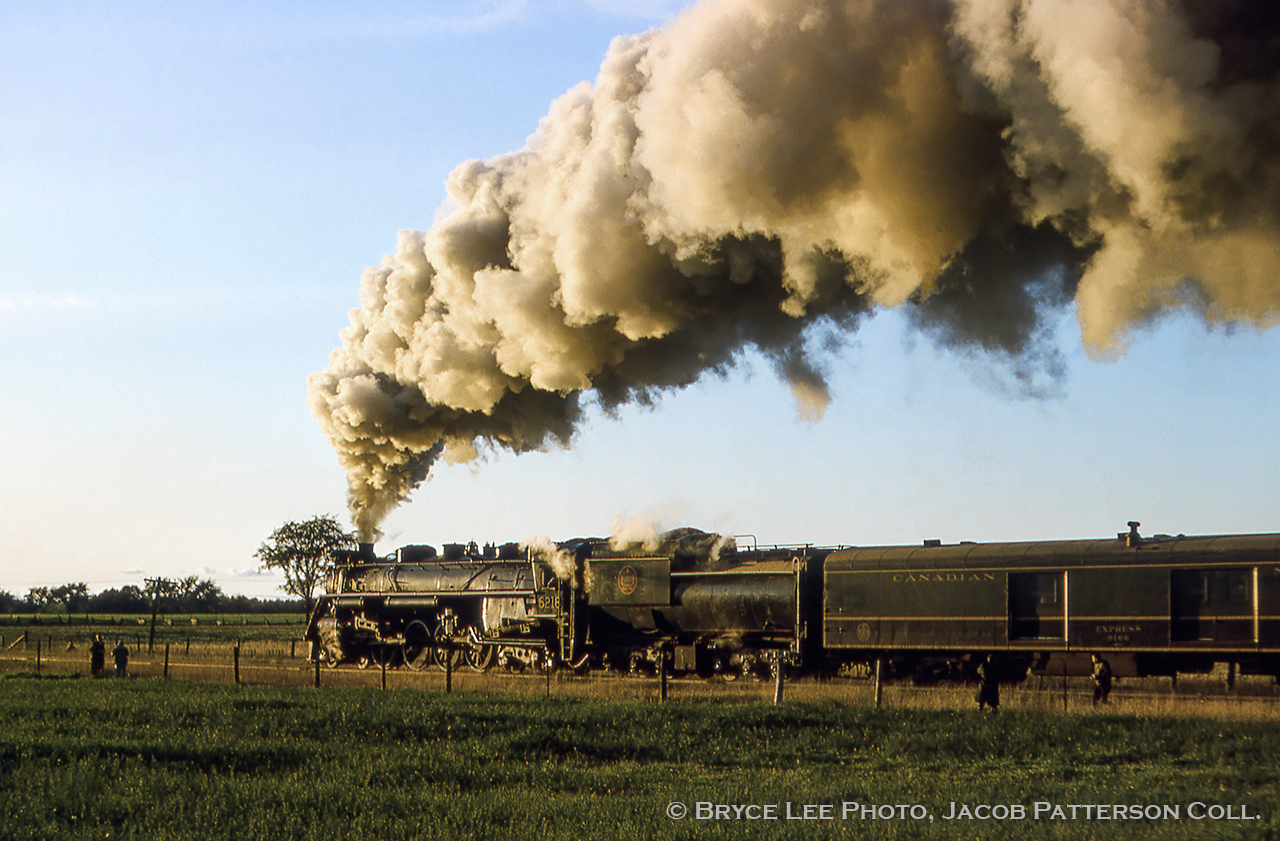 Homeward bound to Toronto, CNR 6218 is seen departing Lindsay for the last 68 miles to Union Station.  Today's trip run by the Upper Canada Railway Society was a two part excursion, running behind 6218 from Toronto to Lindsay, and continuing from Lindsay to Haliburton and return behind a pair of GMD-1s, as had been done the year prior in 1963.


More steam at Lindsay:CNR 6167 coaling up: Bill Thomson, 1962CNR 6167 eastbound on the Campbellford Sub: Bruce Lowe, 1964Bryce Lee Photo, Jacob Patterson Collection slide.  Geotagged location not exact.