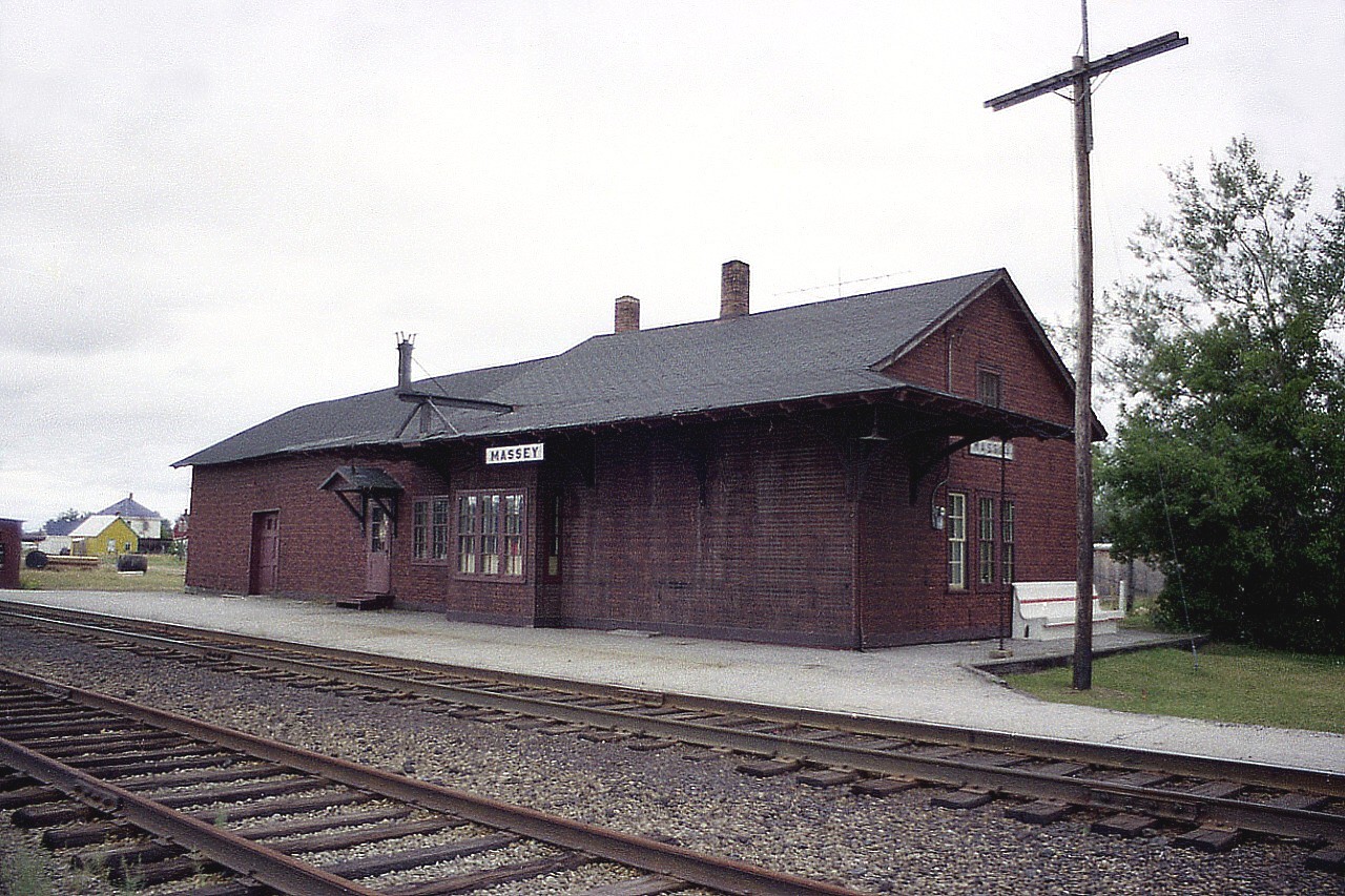 Still another image from the old station series; this time..... Massey.  This community of 800+ people is part of the aux Sables-Spanish River district between the SOO and Sudbury, and this structure, built back around 1885 once was the passenger stop for the Budd cars that ran between those two cities. Service was discontinued in the 1970s and I have not a demolition date for old insul-brick Massey station, but I am guessing about 1982. This line is currently served by the Huron Central.