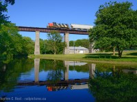 Welp, that's all folks. In better days, CN 1408 had the mainline all by itself as it led L568 from Kitchener to London and back, here seen crossing eastward on the Guelph subdivision.  Crossing over Trout Creek, itself joining the Thames River just to the west, you'd not realize in less than a year 1408 would be retired for good. Looks like the end has come for our GMD-1's - we'll see how much longer the remaining few last...<br><br>Source: Railfan & Railroad: <a href=http://railfan.com/canadian-national-purges-fleet-of-unique-gmd-1-locomotives/ target=_blank>http://railfan.com/canadian-national-purges-fleet-of-unique-gmd-1-locomotives/</a>