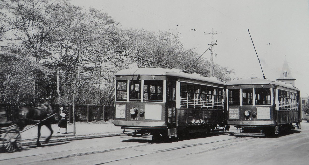MILITARY ROAD MEET. Many may not know that the City of St. John's hosted the most easterly street railway on the entire continent from 1900 to 1948. While visiting St. John's for the Royal Visit of June 1939, the late Thomas Harvey of Grand Falls was able to capture some beautiful images of the Newfoundland Light & Power Company's narrow gauge Birney cars in action. Here NLP #16 is on the siding while NLP #13 continues eastward on Military Road, part of the Belt Line Route to the next stop at the famed Newfoundland Hotel. The steeple of St. Thomas Church can be seen in the background while an almost 'ghostly' horse and buggy appear in front of the woman strolling. Note the horse and buggy on the left side, at the time Newfoundland still observed the British rule of the road which wound not change until January 2nd of 1947. This image - credited to the collection of his son, Dr. Neil Harvey - and dozens of others can be seen in my latest release STREETCARS OF ST. JOHN'S in a 'then & now' format.