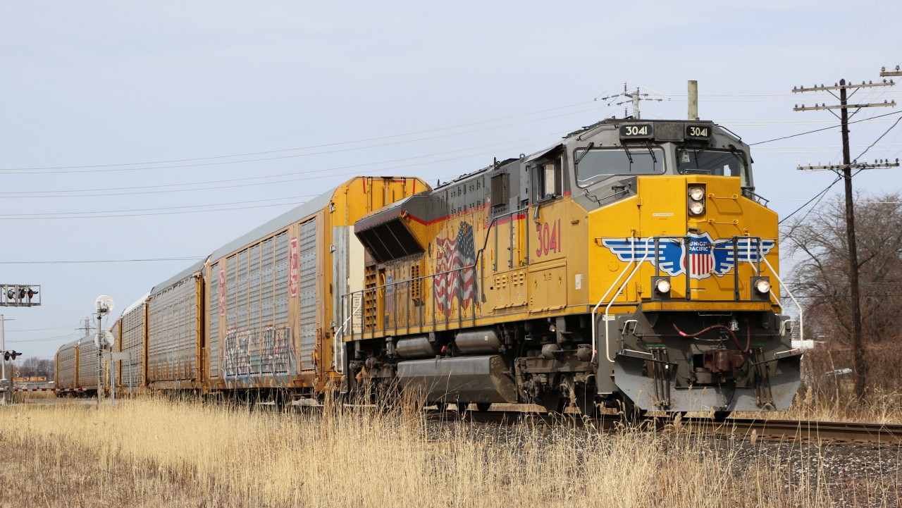CP 244 with UP SD70AH 3041, departs Windsor Yard after making a lift and will proceed back to its train before heading east.