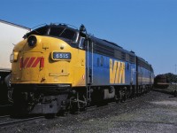 VIA FP9A 6515 leads train #3 The Super Continental into Barrie, Ontario on September 1st 1979.  The following two B units were 6628 and 6610.  The train had 16 cars.