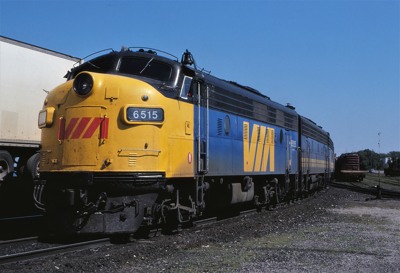 VIA FP9A 6515 leads train #3 The Super Continental into Barrie, Ontario on September 1st 1979.  The following two B units were 6628 and 6610.  The train had 16 cars.