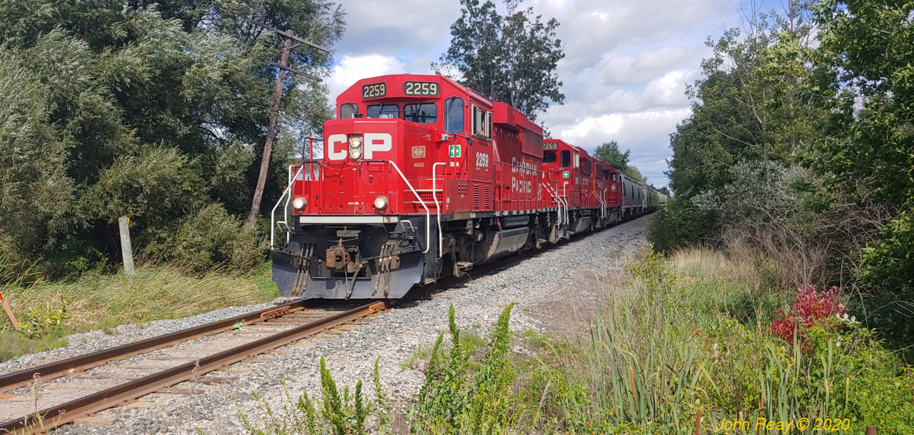 Westbound T07 (Havelock turn) crossing Airport Road in Peterborough on the way back to CP's Agincourt Yard on 4th September, 2020.