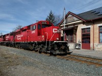 CP Rail train T08 rolls past Peterborough station on its way to Havelock and then up the 20 mile long Nephton Subdivision to Blue Mountain where it will service the nepheline syenite mine.  Power is a pair of GP20C- ECO’s and a GP38-2.  Peterborough station, built in 1884 by the O&Q Rwy, is one of the earliest CPR stations in Canada still on its original site.