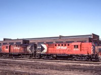 CP 8733 and CP 8791 are in Hamilton, Ontario on March 27, 1984.
