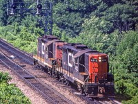 CN 4512 and CN 4520 are eastbound leaving Bayview Junction on July 2, 1981.
