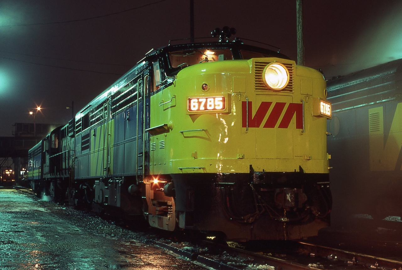 Some fresh paint and light rain can highlight details....


  MLW 1959 built ex CN FPA-4  #6785 is resplendent in the new VIA livery...


  at CN Spadina, December 7, 1980 Kodachrome by S.Danko