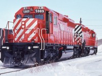 <br>
<br>
  Factory Fresh GMD built SD40-2  CP Rail 5989 & 5990
<br>
<br>
  as of 2018 CP 5989 on CP's roster, with 5990 for sale by tender October 2019
<br>
<br>
  Special times at Quebec St., London, January 17, 1981 Kodachrome by S. Danko
<br>
<br>
  Notable:
<br>
<br>
   … once upon a time Canada had three major diesel locomotive manufacturers: CLC Kingston (F-M licensee), MLW Montreal ( ALCO licensee) and the diesel age GMD London (EMD licensee).....then due to market influences all moved through various permutations and with federal government policies ( absent, weak and/or lacking thereof).....all extinct
<br>
<br>
  ...GMD released units in bunches, see more new SD's, same weekend:
<br>
<br>
 <a href="http://www.railpictures.ca/?attachment_id=  44035">   DRF-30u     </a>
<br>
<br>