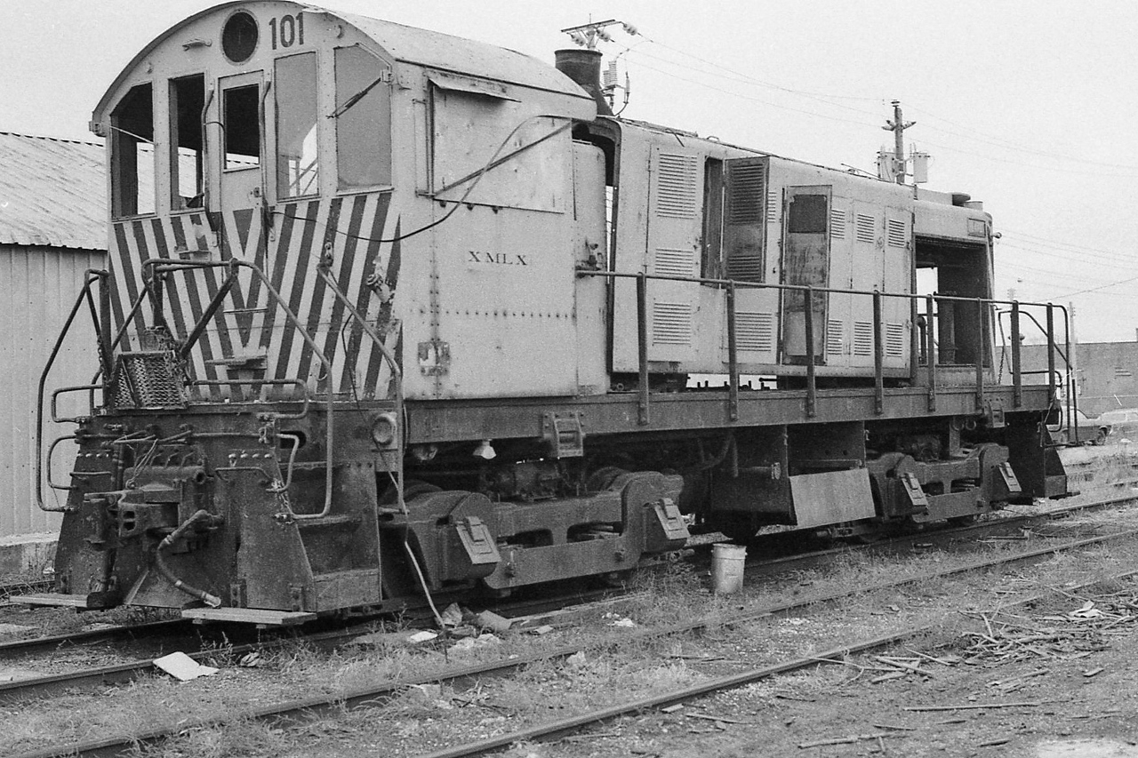 So, when is locomotive, no longer a locomotive ?


   Traction motor platform....rather... frame with traction motored trucks …a k a.....a calf ?


    Perhaps let's start over....


   Carrying AAR Reporting Mark   XALX  , an ALCO S,  former R&S #101 and perhaps former  A&JR#101 * is sans prime mover, radiators and more, rests outside the fence at Andrew Merrilees Ltd


   Anyone know if  XMLX  former  R&S#101 did return to service  ?  and survived  to 1990  ?


   at West Toronto, December 22, 1979  Kodak Tri X negative by S.Danko


    *  Alma and Jonquieres Railway, owned by Alcan, merged into Roberval and Saguenay Railway on  January 1 , 1974
