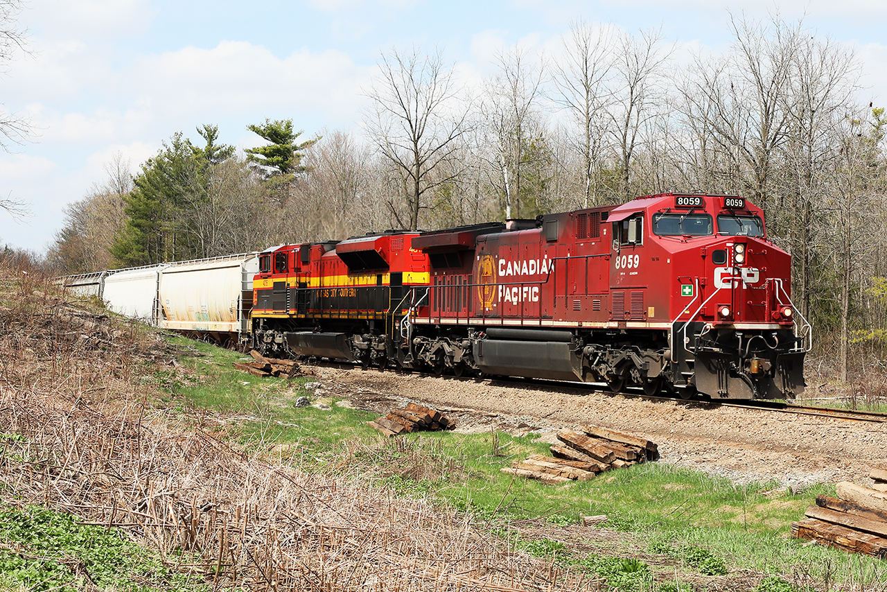 The second most popular train on the Hamilton Sub today...2 hours later it was followed by a ballast train led by 2 CMQ SD40-2F's.....starts down the hill to Hamilton with what may become a relatively common consist in the next few years.