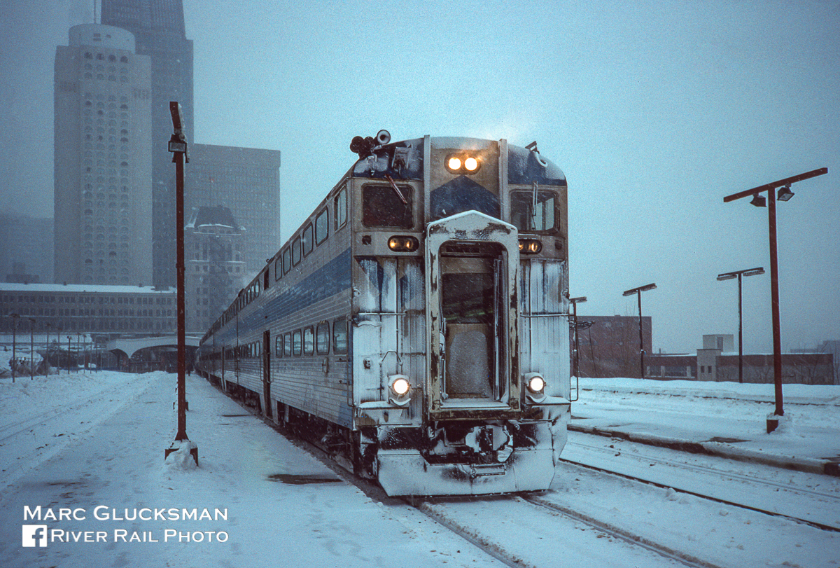 On February 16, 1993, STCUM control car 900 (Vickers, 1969) prepares to lead a commuter train from Gare Windsor in Montreal, Quebec. On April 23, 2021, after more than a decade of retirement, this car was donated to Exporail Canadian Railway Museum in Saint-Constant, Quebec, the only remaining example of this class of car.