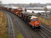 CN 3233 (In military veteran scheme) leads CN X123 through Ville Saint-Pierre from the Saint-Jaques overpass.